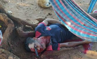 Human trashed, shot and left with knife in the eye