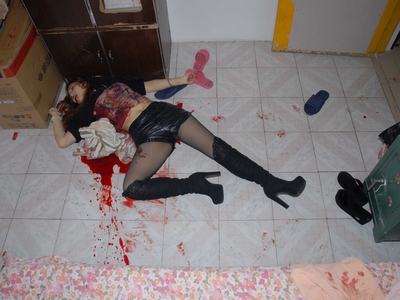 Prostitute found dead in room (examined)