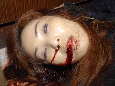 Prostitute found dead in room (examined)