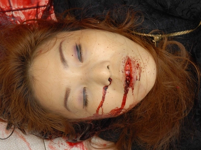 Prostitute found dead in room (examined)