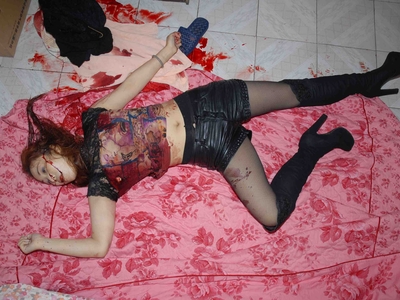 Prostitute found dead in room (examined)