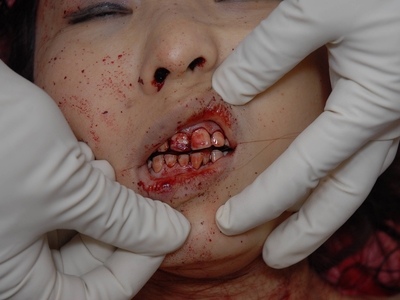 Prostitute found dead in room (examined)