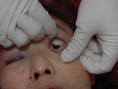 Prostitute found dead in room (examined)