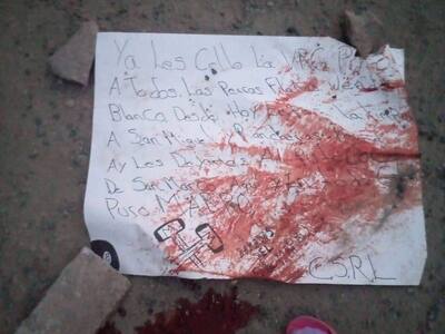 Of course it is Mexico on the streets a corpse with a messeage