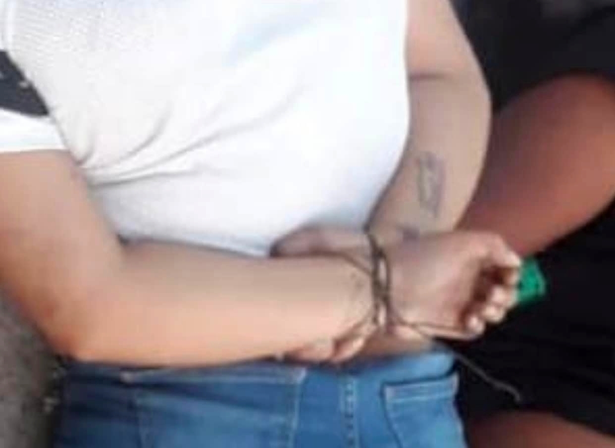 Young Couple Found Garroted in the Street