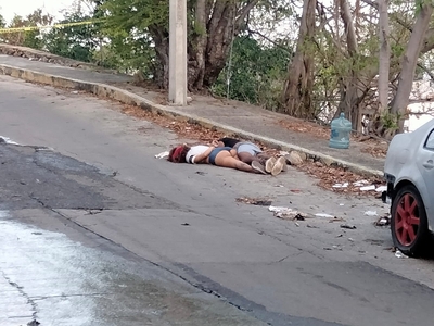Young Couple Found Garroted in the Street