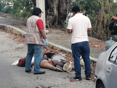 Young Couple Found Garroted in the Street