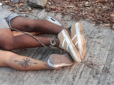 Young Couple Found Garroted in the Street