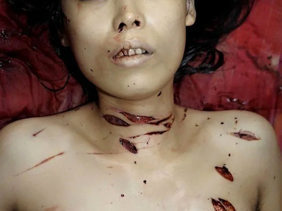 Woman stabbed to death with a partial autopsy at the scene