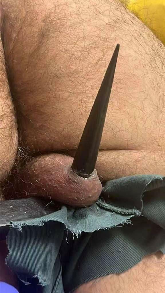 Balls Impaled on railings.