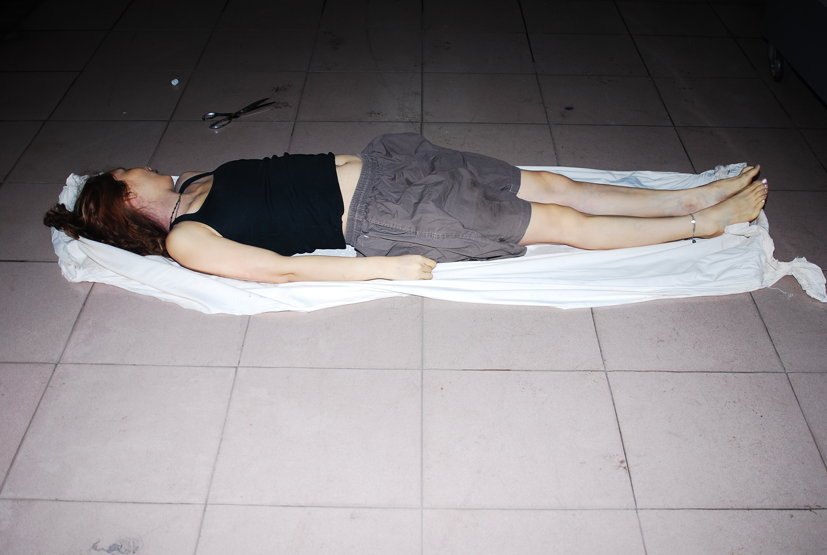 Chinese woman naked in morgue