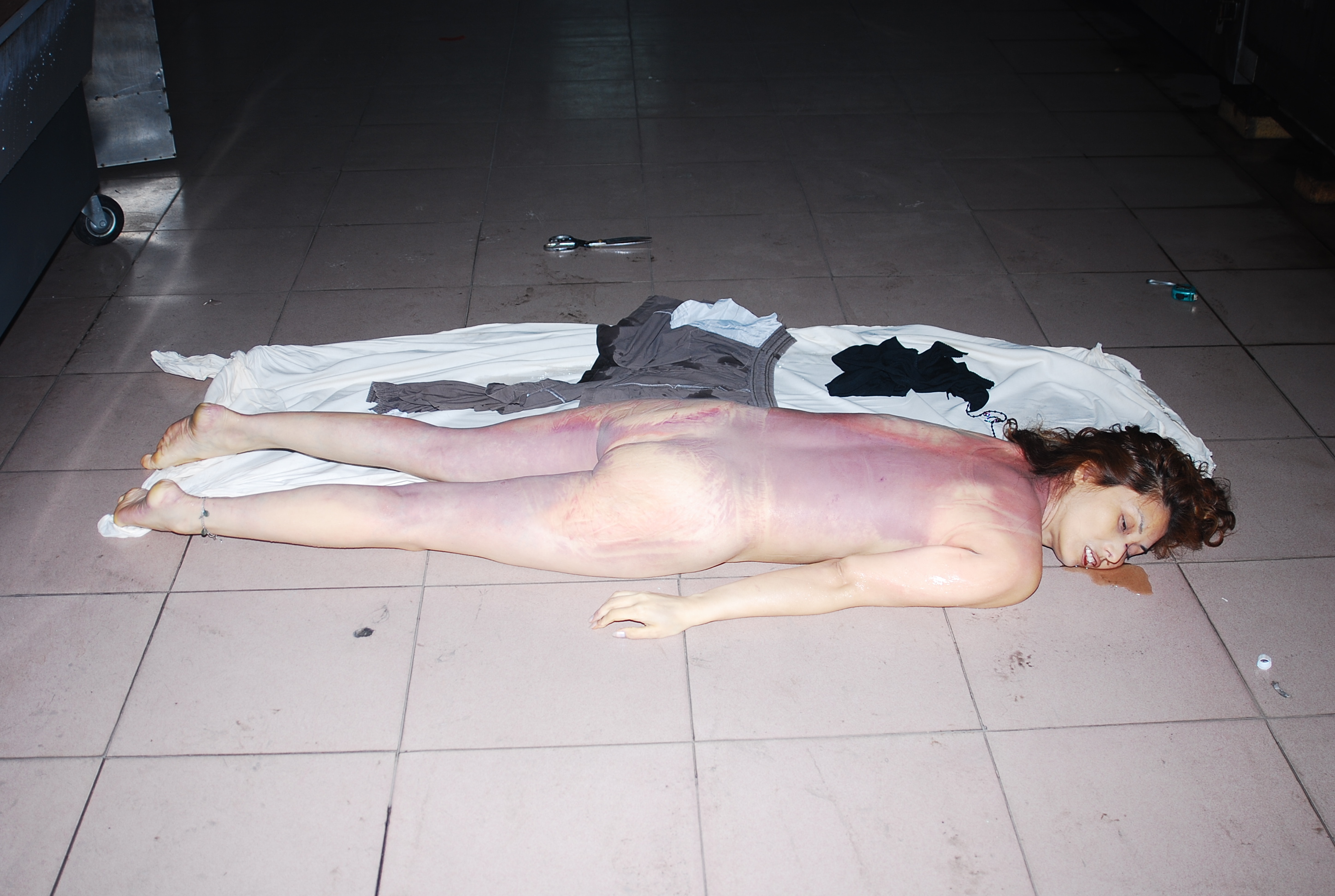 Chinese woman naked in morgue