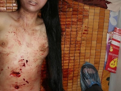 Nude Chinese woman stabbed to death by ex husband 