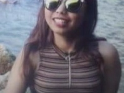 Half naked body of drowned Asian young woman 