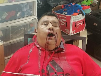 Tied to a chair and shot