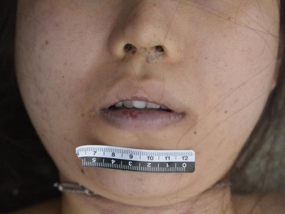 Pretty Chinese woman strangled to death by jealous husband 