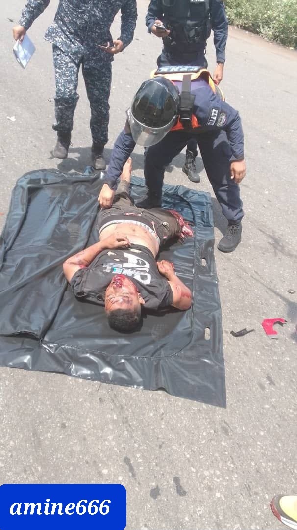 Motorcyclist crushed dead under truck