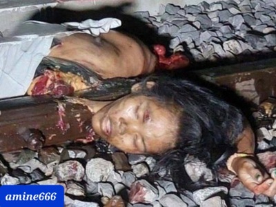 Indian woman commit suicide under train