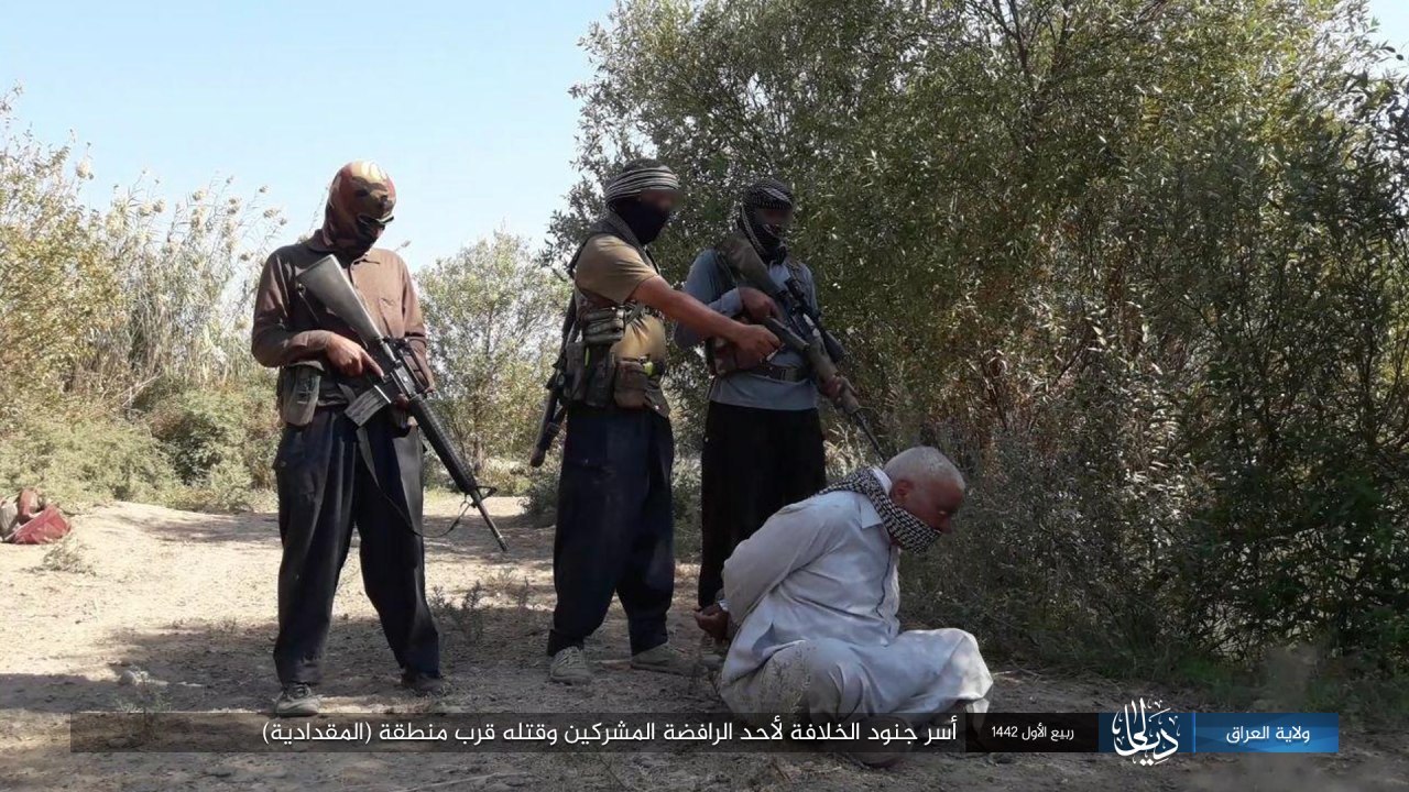 Caliphate soldiers captured and killed a Rafidah