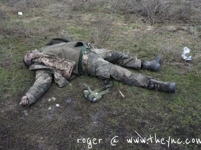 Ukraine: bodies & destroyed vehicles.