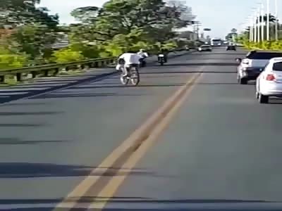Crazy drunk cyclist goes bowling.