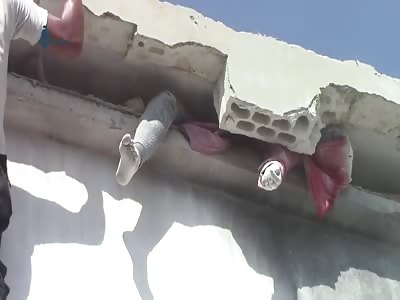 Syria: Woman crushed to death after building collapses 