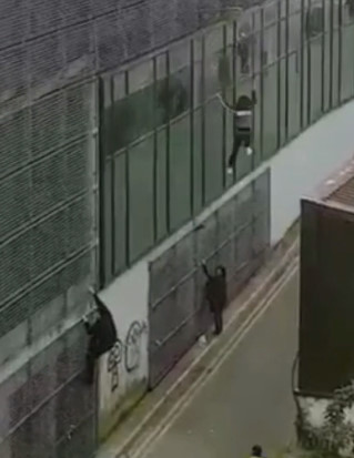 Man Climbing Aldi Building in Waterford Falls Off While Having a Race