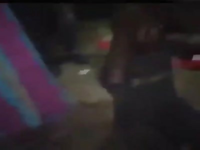 Thief beaten by angry mob.