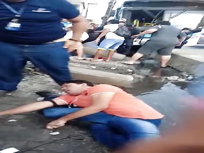 Members of the public try to help accident victim.