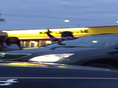 Fight breaks out at the Waffle House parking lot