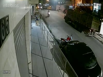 DAMN: Biker Slides Underneath Bus Wheel at High Speed