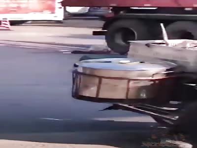 Bicycle rider crushed by semi truck.