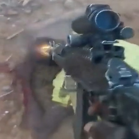 Nigerian Takes Machine Gun to the Head.