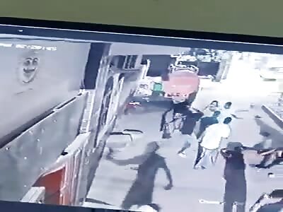 Man beaten to death in front of his wife.