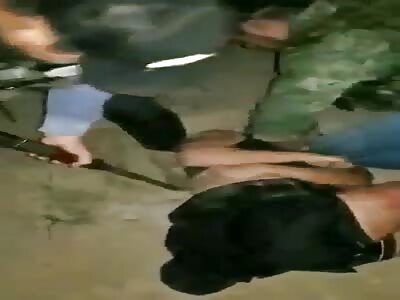 Hitmen Dress a Rival as a Woman and Execute Him Mercilessly .