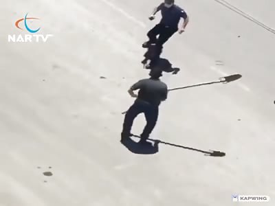 Cops attacked by guy with spade 