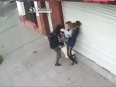 A woman was cornered and robbed.