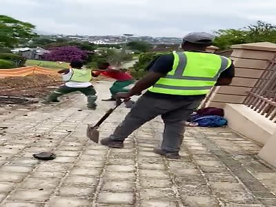 Coworker spreads love with spade.