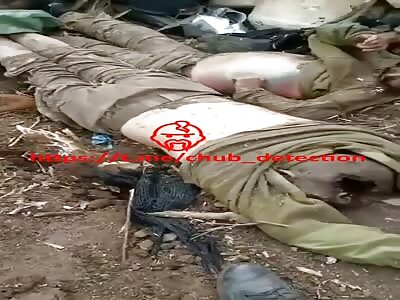 Russian soldiers loot Ukrainian corpses