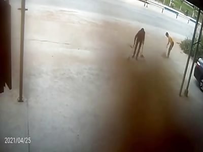 Truck transporting mud narrowly misses pedestrians