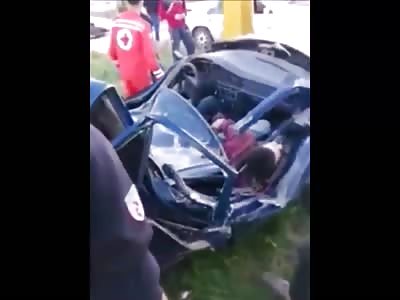 Cutting a corpse from the wreckage 