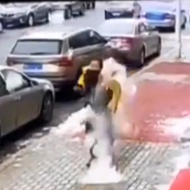 Ice Chunk Knocks Down Courier after Falling from 8-Storey Building.