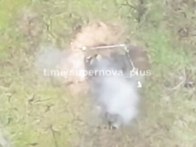 Drone drop on top of two Russian soldiers