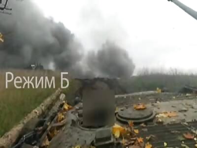 RU armoured vehicle driving over a mine