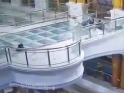 Man Falls Through Glass Floor