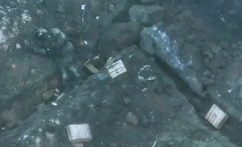 Ukrainian artillery firing at a Russian trench