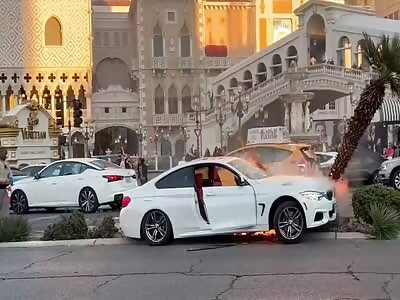 People pull passed out man from flaming car 