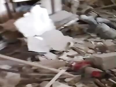 UA soldier shows the aftermath of a strike on a RU position