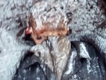 Ukrainian soldier finds a Russian tank crewman frozen body