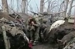 A Group of Russian soldiers firing from a trench
